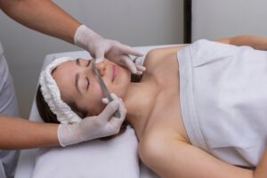 Young,Woman,Lying,On,A,Stretcher,In,An,Aesthetic,Center